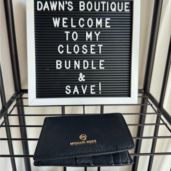 Black Michael Kors Wallet. L 5 1/4” W 1 1/2” H 4” - Picture 5 of 5